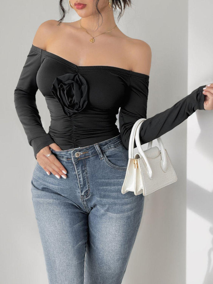 Perfee Ruched Flower Off-Shoulder Long Sleeve Bodysuit - JOWLILI